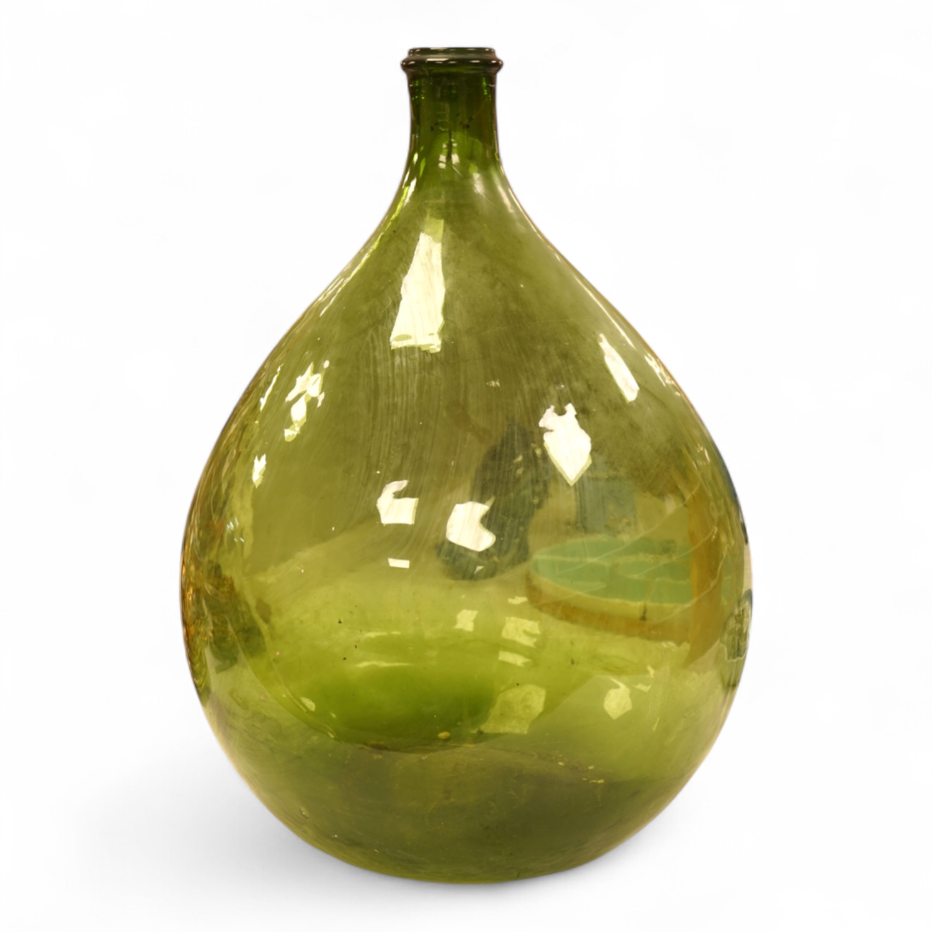 A large green glass carboy 51cm high